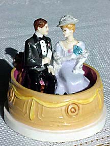 A Victorian couple conversing at the opera